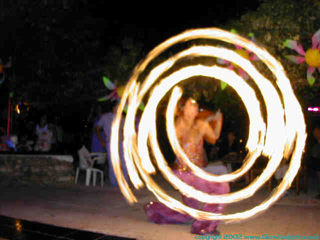 Fire poi performer at Tribe of Frog